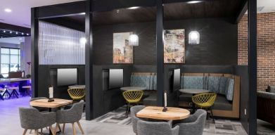 Lounge and coworking space with work pods at Courtyard By Marriott Houston Heights/I-10.