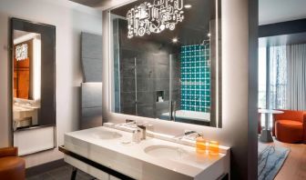 Private guest bathroom with shower at Hotel Nia, Autograph Collection.