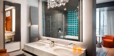 Private guest bathroom with shower at Hotel Nia, Autograph Collection.