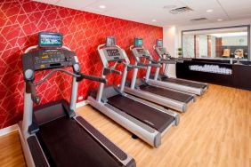 Well equipped fitness center at Courtyard By Marriott Boston Brookline.