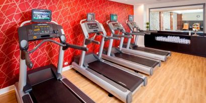 Well equipped fitness center at Courtyard By Marriott Boston Brookline.