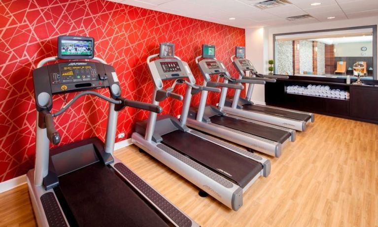 Well equipped fitness center at Courtyard By Marriott Boston Brookline.