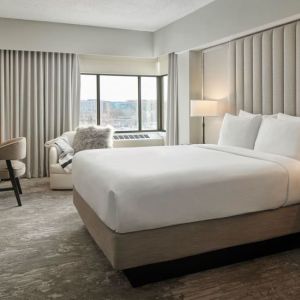 King bedroom with business desk at Capitol Hill Hotel.