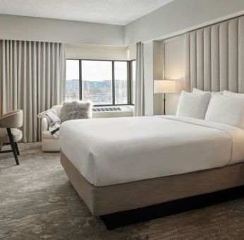 King bedroom with business desk at Capitol Hill Hotel.