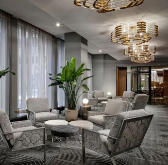 Lounge and coworking space at Rand Tower Hotel, Minneapolis, A Marriott Tribute Portfolio Hotel.