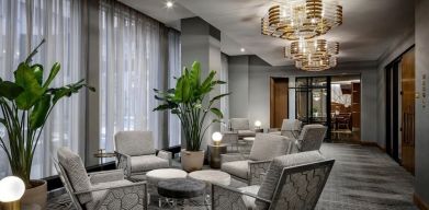 Lounge and coworking space at Rand Tower Hotel, Minneapolis, A Marriott Tribute Portfolio Hotel.