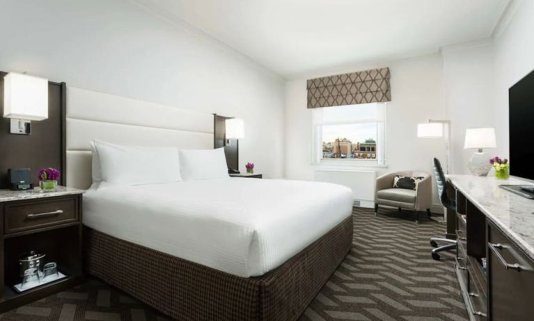 King bedroom with desk and TV at Boston Park Plaza.