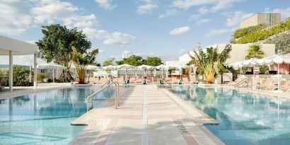 Stunning outdoor pool with pool seating area at The Goodtime Hotel.