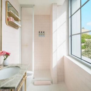 Guest bathroom with shower at The Goodtime Hotel.