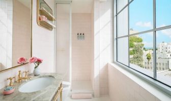 Guest bathroom with shower at The Goodtime Hotel.