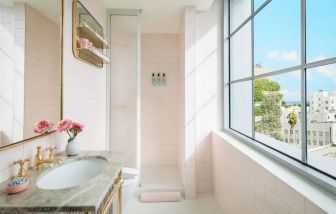 Guest bathroom with shower at The Goodtime Hotel.