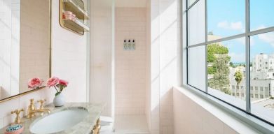 Guest bathroom with shower at The Goodtime Hotel.