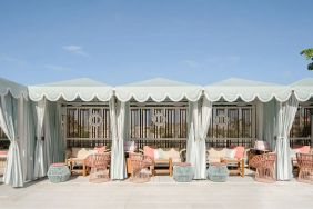 Shaded seating area outside ideal for coworking at The Goodtime Hotel.