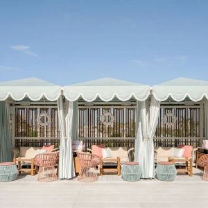 Shaded seating area outside ideal for coworking at The Goodtime Hotel.