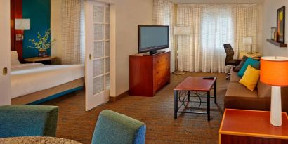 Day use room with TV and lounge area at Residence Inn Boston Tewksbury.
