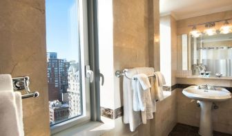 Private guest bathroom with shower at Beacon Hotel.