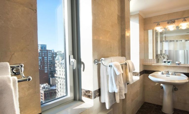 Private guest bathroom with shower at Beacon Hotel.