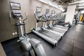 Well equipped fitness center at Beacon Hotel.