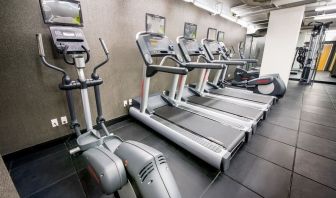 Well equipped fitness center at Beacon Hotel.