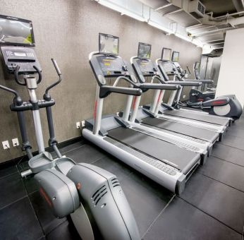 Well equipped fitness center at Beacon Hotel.