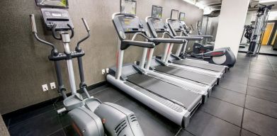 Well equipped fitness center at Beacon Hotel.