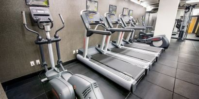 Well equipped fitness center at Beacon Hotel.