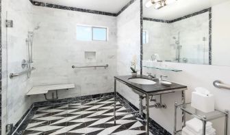 Guest bathroom with shower at Maison 140 Beverly Hills.