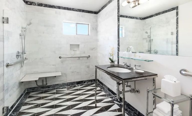 Guest bathroom with shower at Maison 140 Beverly Hills.