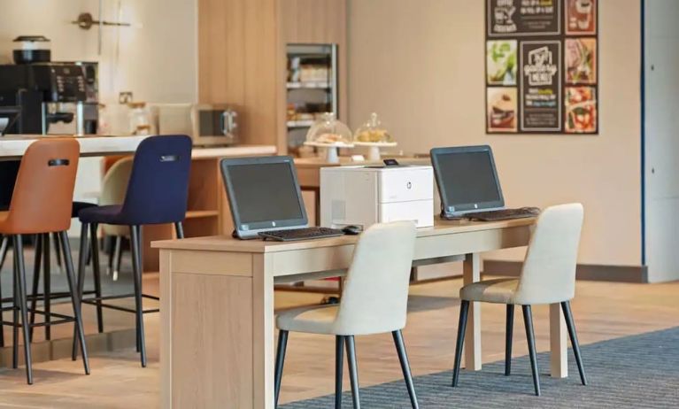 Business center with PC, internet, and printer at Hyatt Place London Heathrow Airport.