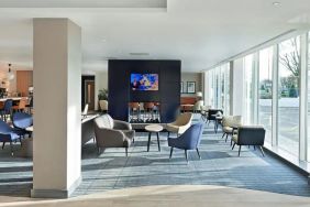 Lounge and coworking space at Hyatt Place London Heathrow Airport.