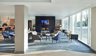 Lounge and coworking space at Hyatt Place London Heathrow Airport.