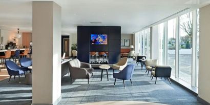 Lounge and coworking space at Hyatt Place London Heathrow Airport.