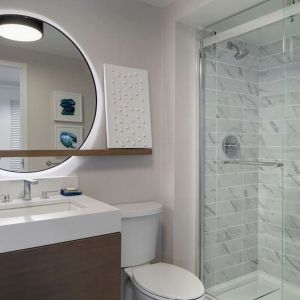 Private guest bathroom with shower at Hyatt Regency Boston Harbor - Logan Airport.