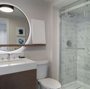 Private guest bathroom with shower at Hyatt Regency Boston Harbor - Logan Airport.