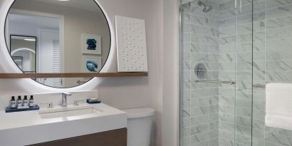 Private guest bathroom with shower at Hyatt Regency Boston Harbor - Logan Airport.