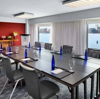 Professional meeting room with city views at Hyatt Regency Boston Harbor - Logan Airport.