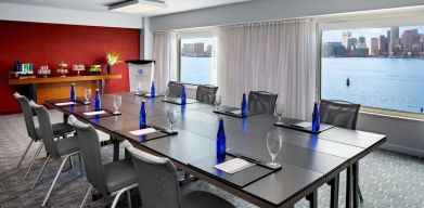 Professional meeting room with city views at Hyatt Regency Boston Harbor - Logan Airport.