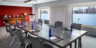 Professional meeting room with city views at Hyatt Regency Boston Harbor - Logan Airport.