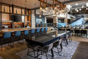 Bar, lounge, and coworking space at Hyatt Regency Boston Harbor - Logan Airport.