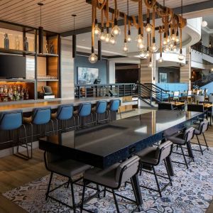 Bar, lounge, and coworking space at Hyatt Regency Boston Harbor - Logan Airport.