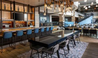 Bar, lounge, and coworking space at Hyatt Regency Boston Harbor - Logan Airport.