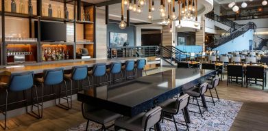 Bar, lounge, and coworking space at Hyatt Regency Boston Harbor - Logan Airport.