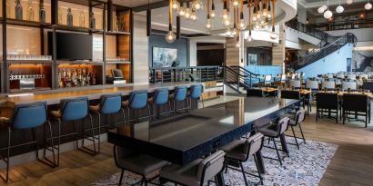 Bar, lounge, and coworking space at Hyatt Regency Boston Harbor - Logan Airport.