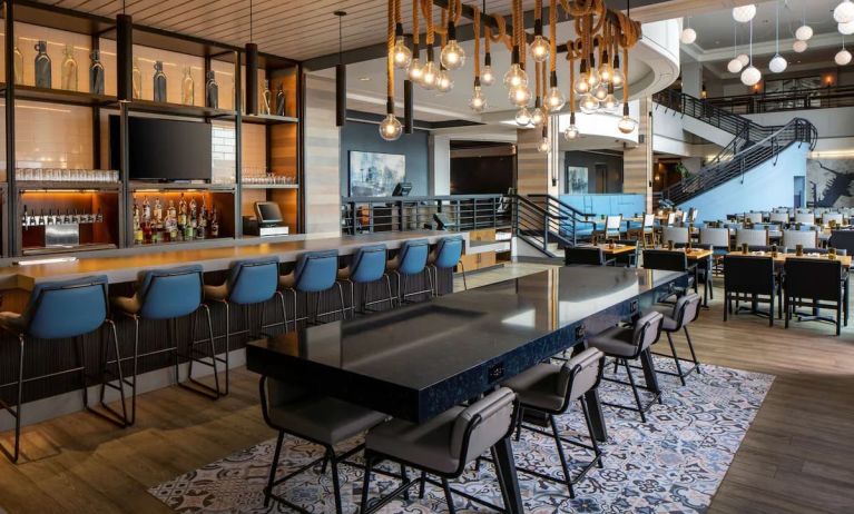 Bar, lounge, and coworking space at Hyatt Regency Boston Harbor - Logan Airport.