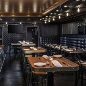 Dining area perfect for coworking at Hotel Shocard NYC.