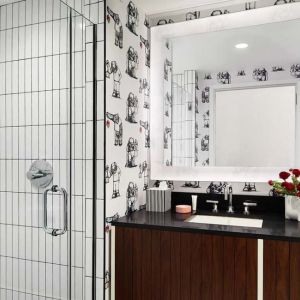 Private guest bathroom with shower at Graduate New York.