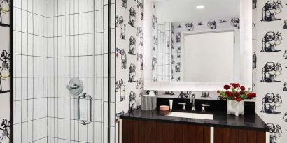 Private guest bathroom with shower at Graduate New York.