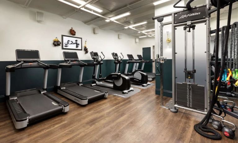 Well equipped fitness center at The Candler Hotel Atlanta, Curio Collection By Hilton.