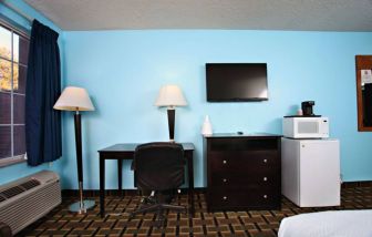 Day use room amenities at Coratel Inn & Suites By Jasper Newton.