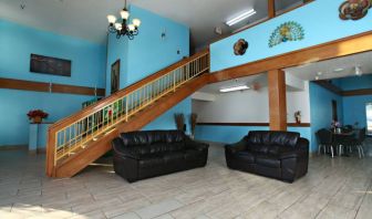 Lobby area at Coratel Inn & Suites By Jasper Newton.